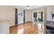 Bedroom features hardwood floors, ceiling fan, and sliding doors at 3521 Lake Bayshore Dr # 3521, Bradenton, FL 34205