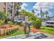 Exterior car wash station with hose and lush landscaping for resident use only at 3521 Lake Bayshore Dr # 3521, Bradenton, FL 34205