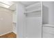 Walk-in closet features shelving and closet rod at 3521 Lake Bayshore Dr # 3521, Bradenton, FL 34205