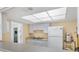 Small shared kitchen with white appliances and ample counter space available at 3521 Lake Bayshore Dr # 3521, Bradenton, FL 34205