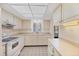 Bright kitchen featuring white cabinets, modern appliances, and ample counter space to make cooking more enjoyable at 3521 Lake Bayshore Dr # 3521, Bradenton, FL 34205