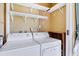 A well-equipped laundry room featuring a side-by-side washer and dryer at 3521 Lake Bayshore Dr # 3521, Bradenton, FL 34205