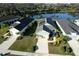Aerial view of a single Gathering home with beautiful lawn and landscaping at 3631 Shimmering Oaks Dr, Parrish, FL 34219