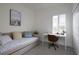 Bright bedroom with a daybed, desk, and a window at 3631 Shimmering Oaks Dr, Parrish, FL 34219