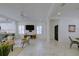 Spacious living area with modern decor, a ceiling fan, and abundant natural light at 3631 Shimmering Oaks Dr, Parrish, FL 34219