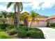 Charming single-story home with lush landscaping and a two-car garage at 3804 Amapola Ln, Sarasota, FL 34238
