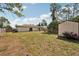Large backyard with shed, and a fenced perimeter at 3881 Holin Ln, North Port, FL 34287