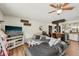 Open-concept living area featuring modern décor, wood-look floors, and plenty of natural light at 3881 Holin Ln, North Port, FL 34287