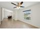 Open concept dining room featuring tile floors, a ceiling fan and a dining room table at 4091 Dull St, North Port, FL 34286