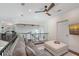 Cozy loft area with comfortable seating, overlooking the great room below at 4108 Roberts Point Rd, Sarasota, FL 34242
