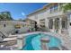Beautiful backyard pool with a seating area and outdoor TV, perfect for relaxing and entertaining at 4108 Roberts Point Rd, Sarasota, FL 34242