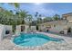 Inviting backyard features a sparkling pool and tropical landscaping at 4108 Roberts Point Rd, Sarasota, FL 34242
