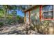 Cozy backyard patio with room to add outdoor seating, plants, and a grill at 4122 Old Bradenton Rd, Sarasota, FL 34234