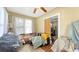 Bedroom with neutral walls, door access, and a window at 4122 Old Bradenton Rd, Sarasota, FL 34234