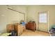 This bedroom includes wood floors, olive green walls, and needs updating at 4122 Old Bradenton Rd, Sarasota, FL 34234