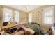 Bedroom featuring natural light from the windows at 4122 Old Bradenton Rd, Sarasota, FL 34234