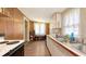 Charming kitchen area with white cabinets, sink, and natural light at 4122 Old Bradenton Rd, Sarasota, FL 34234