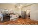 Kitchen with terracotta floors, lots of natural light and stainless steel appliances at 4122 Old Bradenton Rd, Sarasota, FL 34234