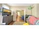 Bright living space with fireplace, TV, and open access to other rooms at 4122 Old Bradenton Rd, Sarasota, FL 34234