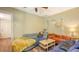 Cozy living room with sofa, interior lighting, and an open doorway at 4122 Old Bradenton Rd, Sarasota, FL 34234