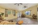 The living room provides lots of light with dual windows and French doors at 4122 Old Bradenton Rd, Sarasota, FL 34234