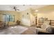 The living room offers a high ceiling, ceiling fan, and views of the backyard at 4122 Old Bradenton Rd, Sarasota, FL 34234