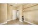 Neutral room with tiled floor and built-in shelves at 4122 Old Bradenton Rd, Sarasota, FL 34234