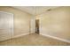 Neutral room with tiled floor and door leading to another room at 4122 Old Bradenton Rd, Sarasota, FL 34234