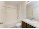 Bathroom features a shower-tub combo and a vanity with a sink at 4206 Park Willow Ave, Palmetto, FL 34221