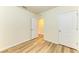 Bright bedroom features wood-look floors and neutral walls at 4206 Park Willow Ave, Palmetto, FL 34221