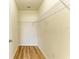 Walk in closet with rod and shelf for organizing clothes, shoes, and accessories at 4206 Park Willow Ave, Palmetto, FL 34221
