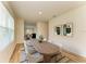 Bright dining room with a wooden table, comfortable seating for six and neutral decor, perfect for Gathering gatherings at 4206 Park Willow Ave, Palmetto, FL 34221