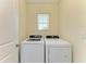 Laundry room featuring a side-by-side washer and dryer at 4206 Park Willow Ave, Palmetto, FL 34221