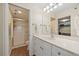 Modern bathroom with white vanity, glass-enclosed shower, and tile flooring at 4570 Pinebrook Cir # 508, Bradenton, FL 34209