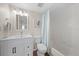Clean bathroom with white fixtures and shower-tub combo at 4570 Pinebrook Cir # 508, Bradenton, FL 34209