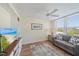 Cozy den with a comfortable sofa and large window with a view at 4570 Pinebrook Cir # 508, Bradenton, FL 34209