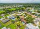 Expansive aerial shot of home featuring a private pool and fenced backyard at 4612 Masefield Pl, Sarasota, FL 34241