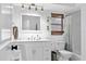 Bathroom with white vanity, neutral walls, and shower/tub combination at 4612 Masefield Pl, Sarasota, FL 34241