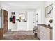 A bright foyer with stylish decor welcomes you at 4612 Masefield Pl, Sarasota, FL 34241