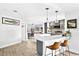 Open kitchen layout featuring a central island with pendant lighting and counter seating at 4612 Masefield Pl, Sarasota, FL 34241