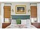 Close up of a bed in the main bedroom, highlighting natural light and stylish furnishings at 4612 Masefield Pl, Sarasota, FL 34241