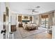 Bright main bedroom featuring backyard access, ample natural light, and stylish decor at 4612 Masefield Pl, Sarasota, FL 34241