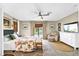 The spacious main bedroom offers natural light, backyard access, and a serene seating area at 4612 Masefield Pl, Sarasota, FL 34241