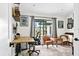 Home office space with natural light, workspace, and views of the fenced backyard at 4612 Masefield Pl, Sarasota, FL 34241