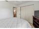 The bedroom is generously sized with a large closet and room for storage at 4758 Breezy Pines Blvd, Sarasota, FL 34232