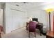 A bright and airy bedroom provides a generous closet and a ceiling fan for comfort at 4758 Breezy Pines Blvd, Sarasota, FL 34232