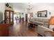Inviting living room featuring hardwood floors and decorative furnishings at 4758 Breezy Pines Blvd, Sarasota, FL 34232