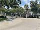 Gated community entrance with black metal fencing and lush landscaping for added privacy at 4802 51St W St # 1724, Bradenton, FL 34210