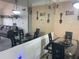 Elegant dining area with a large mirrored wall and seating for four at 4802 51St W St # 1724, Bradenton, FL 34210