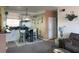 Open dining area featuring a glass table, modern chairs, and stylish decor at 4802 51St W St # 1724, Bradenton, FL 34210